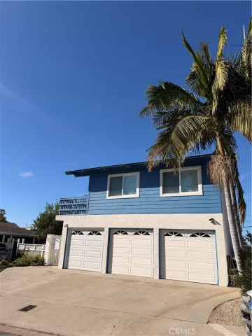 a view of a house with a street