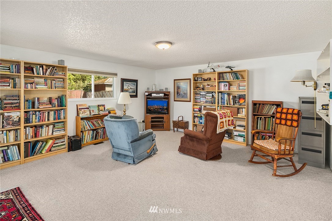 2708 Northeast 24th Street Renton, WA 98056 - Photo 8 of 14 a view of a livingroom with furniture and toys