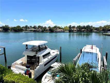 a view of a lake with sitting area