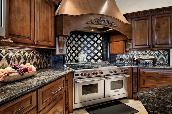 a kitchen with a stove and cabinets