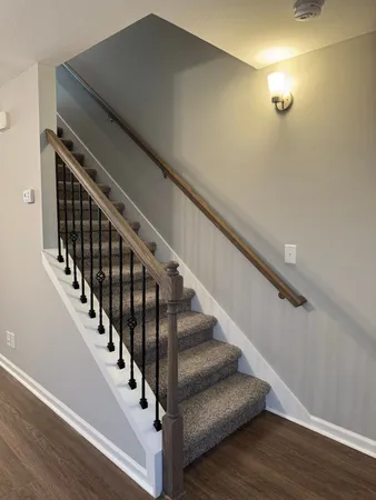 an empty room with closet and a bathroom