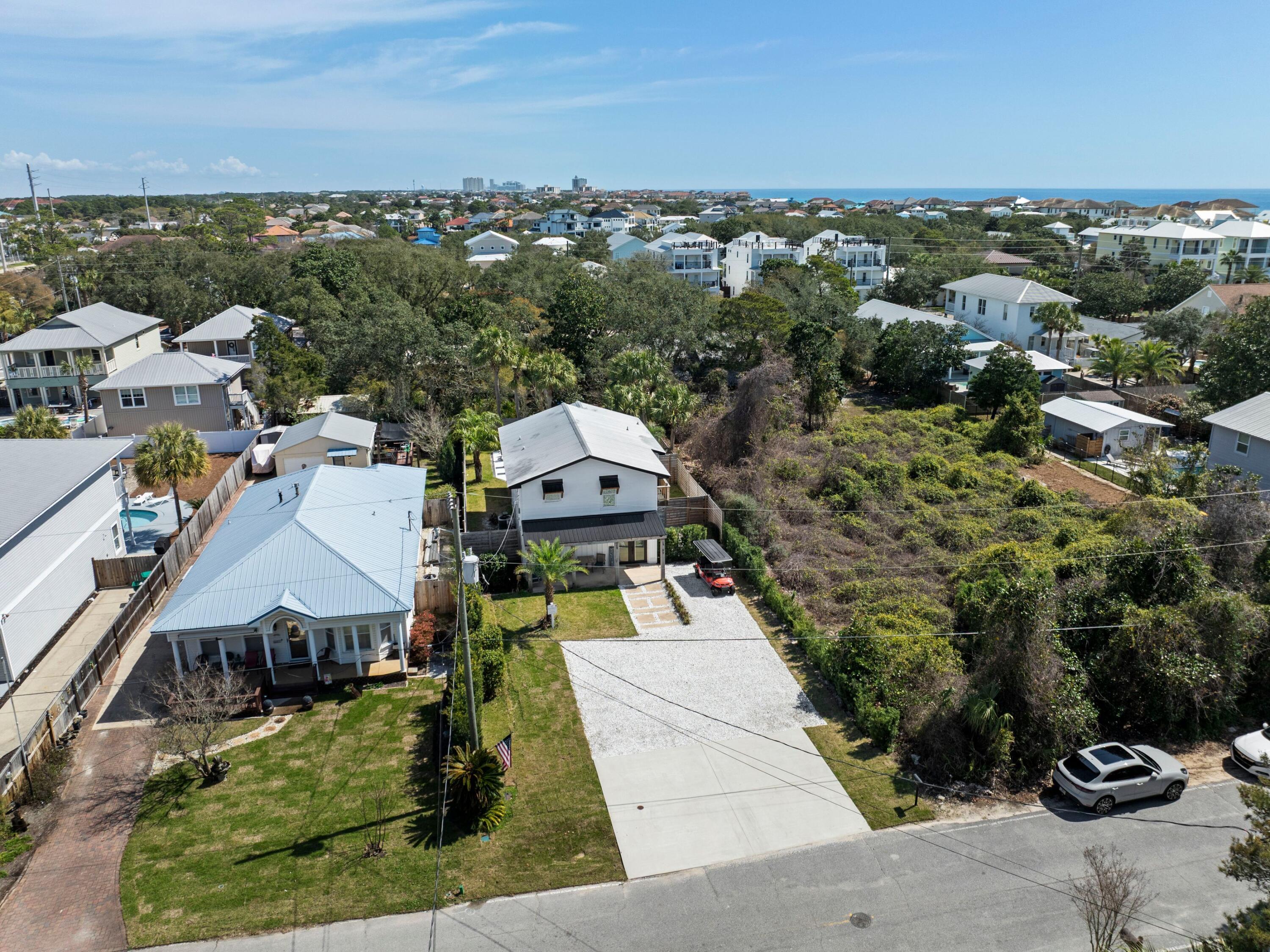 89 Tarpon Street Destin, FL 32541 - Photo 11 of 53 an aerial view of a house with a garden