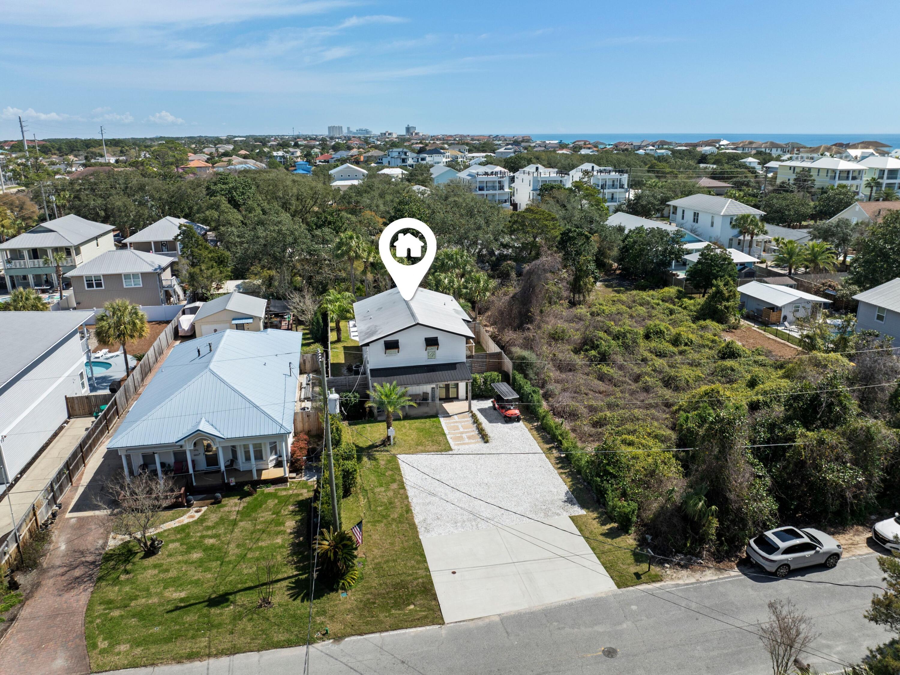 89 Tarpon Street Destin, FL 32541 - Photo 12 of 53 an aerial view of a house with a garden