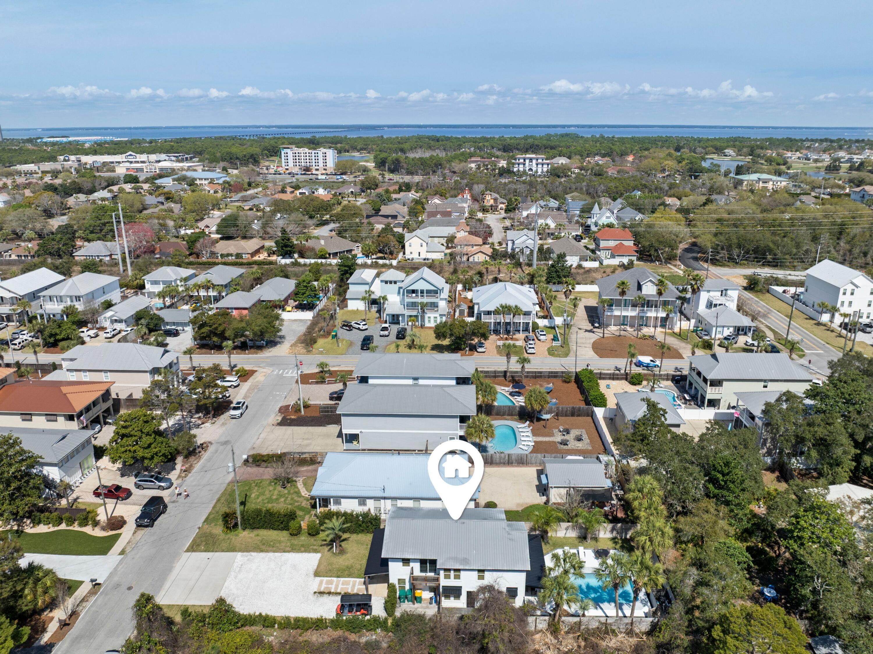 89 Tarpon Street Destin, FL 32541 - Photo 17 of 53 an aerial view of residential houses with outdoor space and ocean view