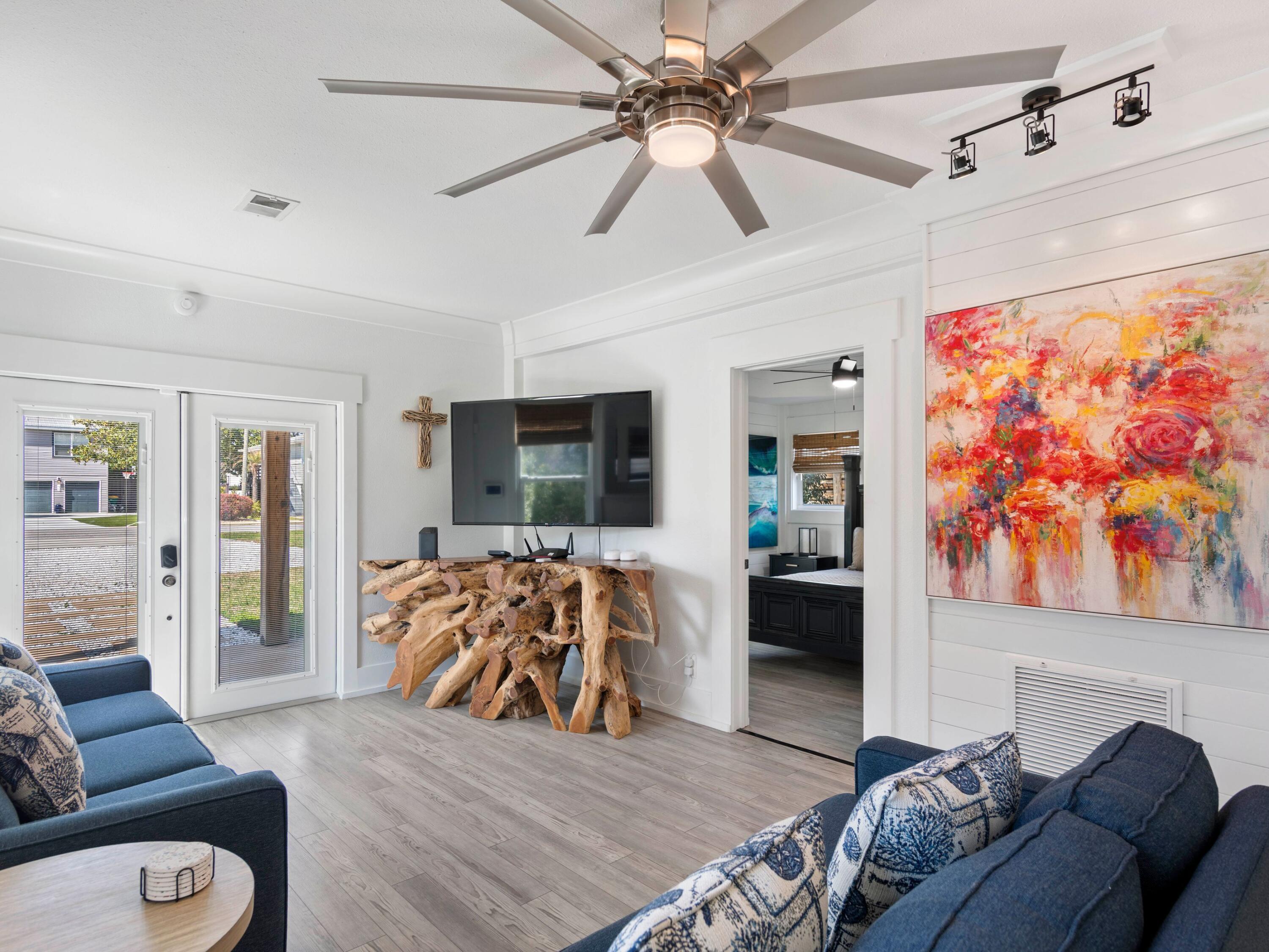 89 Tarpon Street Destin, FL 32541 - Photo 28 of 53 a living room with furniture and wooden floor
