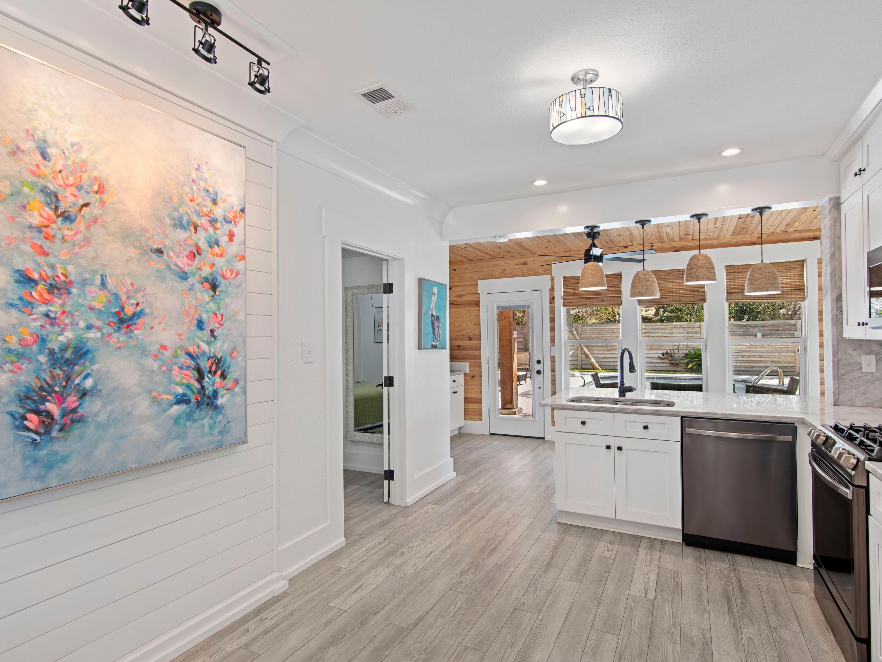 89 Tarpon Street Destin, FL 32541 - Photo 31 of 53 Downstairs kitchen toward pool