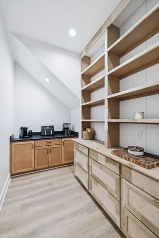 a vase of flowers sitting on a table