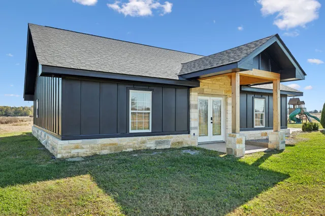 an aerial view of a town with couple of houses