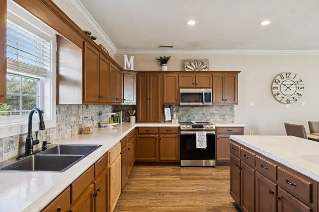 an aerial view of residential building with ocean view