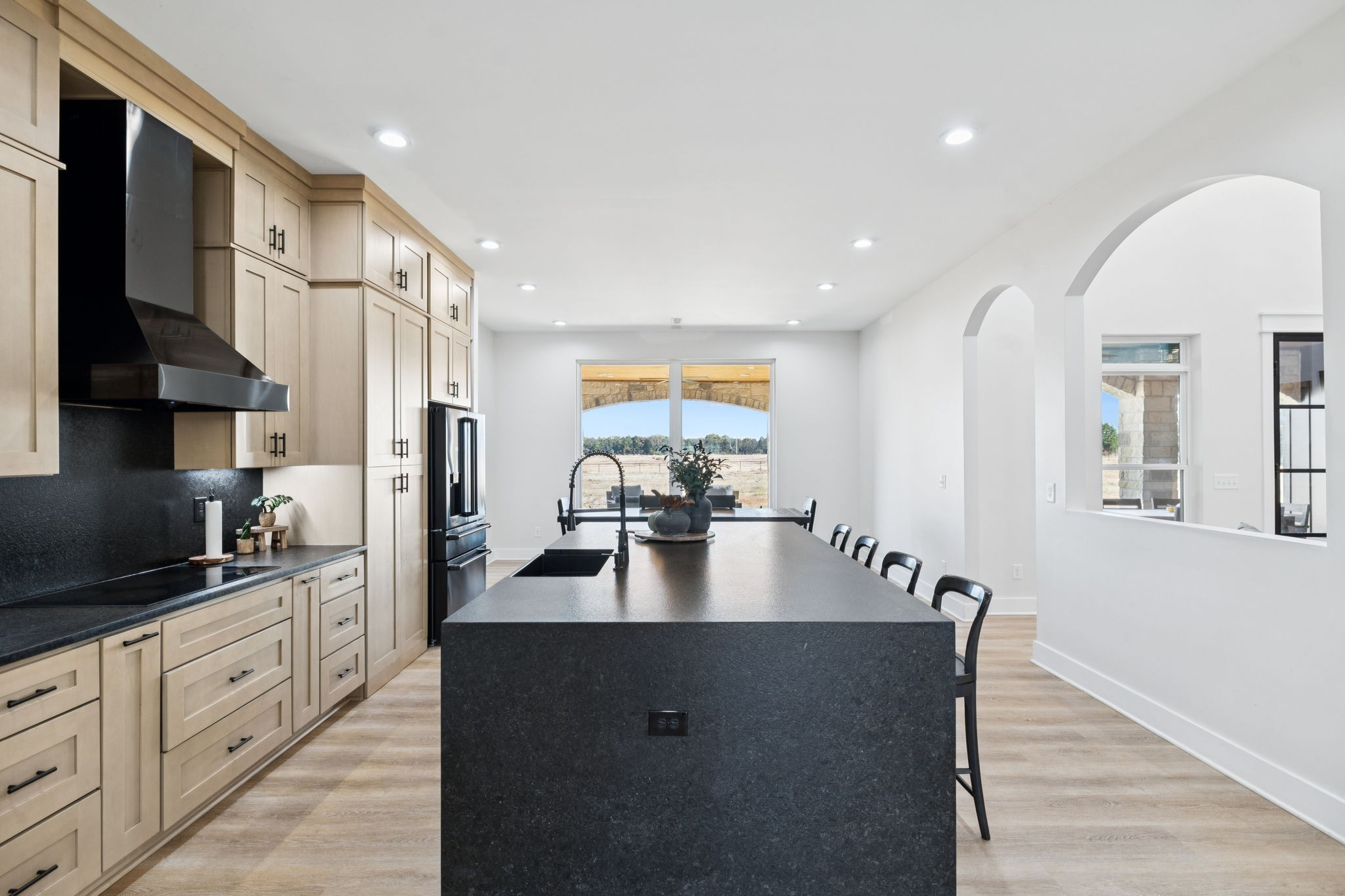 201 Lamb Road Rockvale, TN 37153 - Photo 8 of 87 a kitchen with stainless steel appliances granite countertop a refrigerator a sink dishwasher and white cabinets with wooden floor