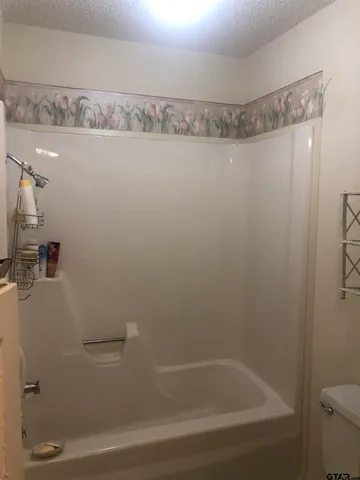 a view of gallery with stairs