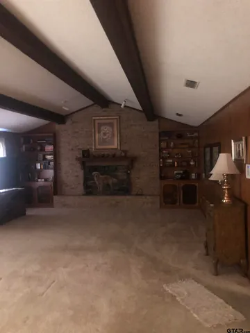 a view of empty room with windows