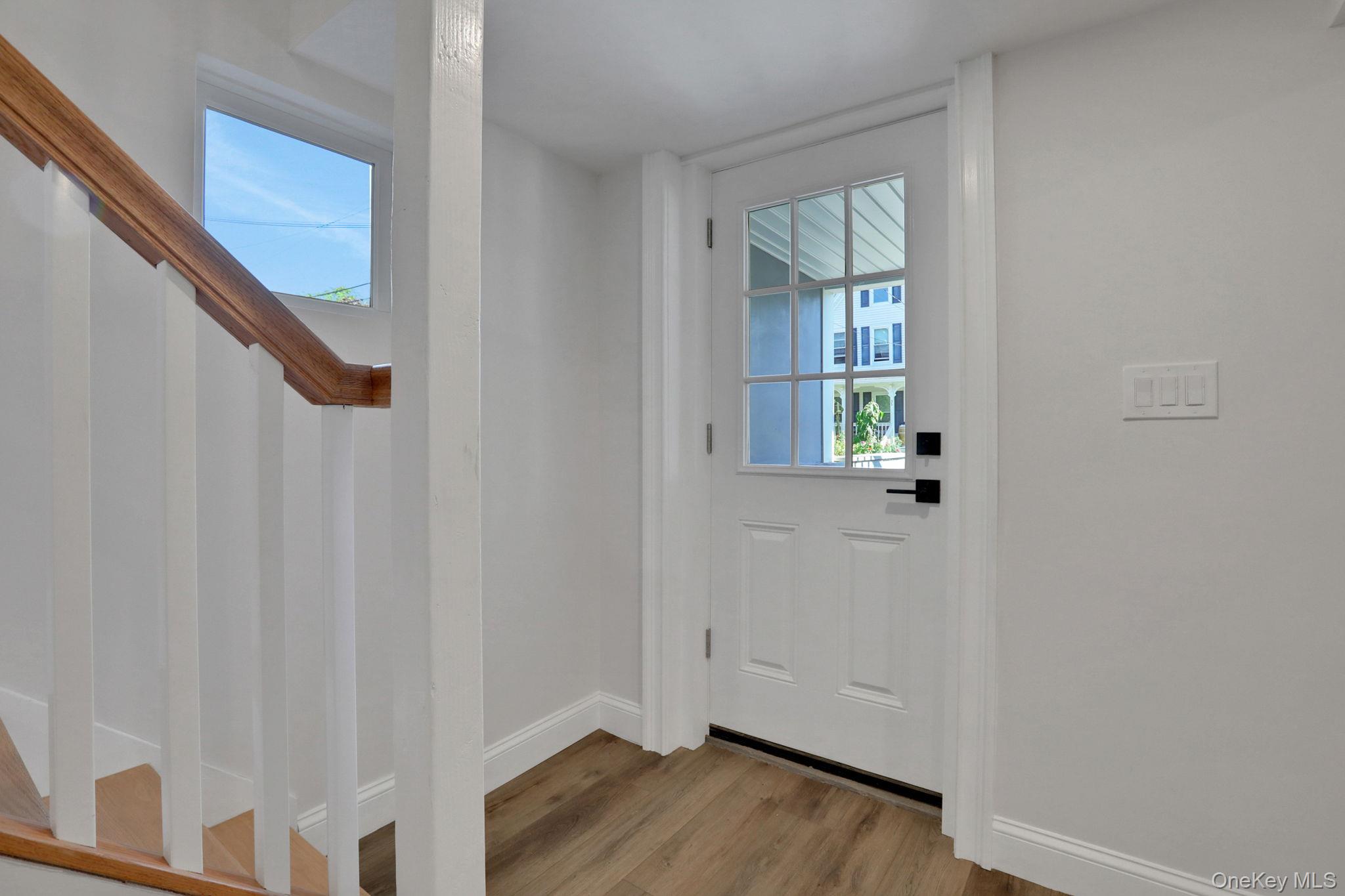 32 Ackerman Street Beacon, NY 12508 - Photo 16 of 37 a view of an entryway with wooden floor