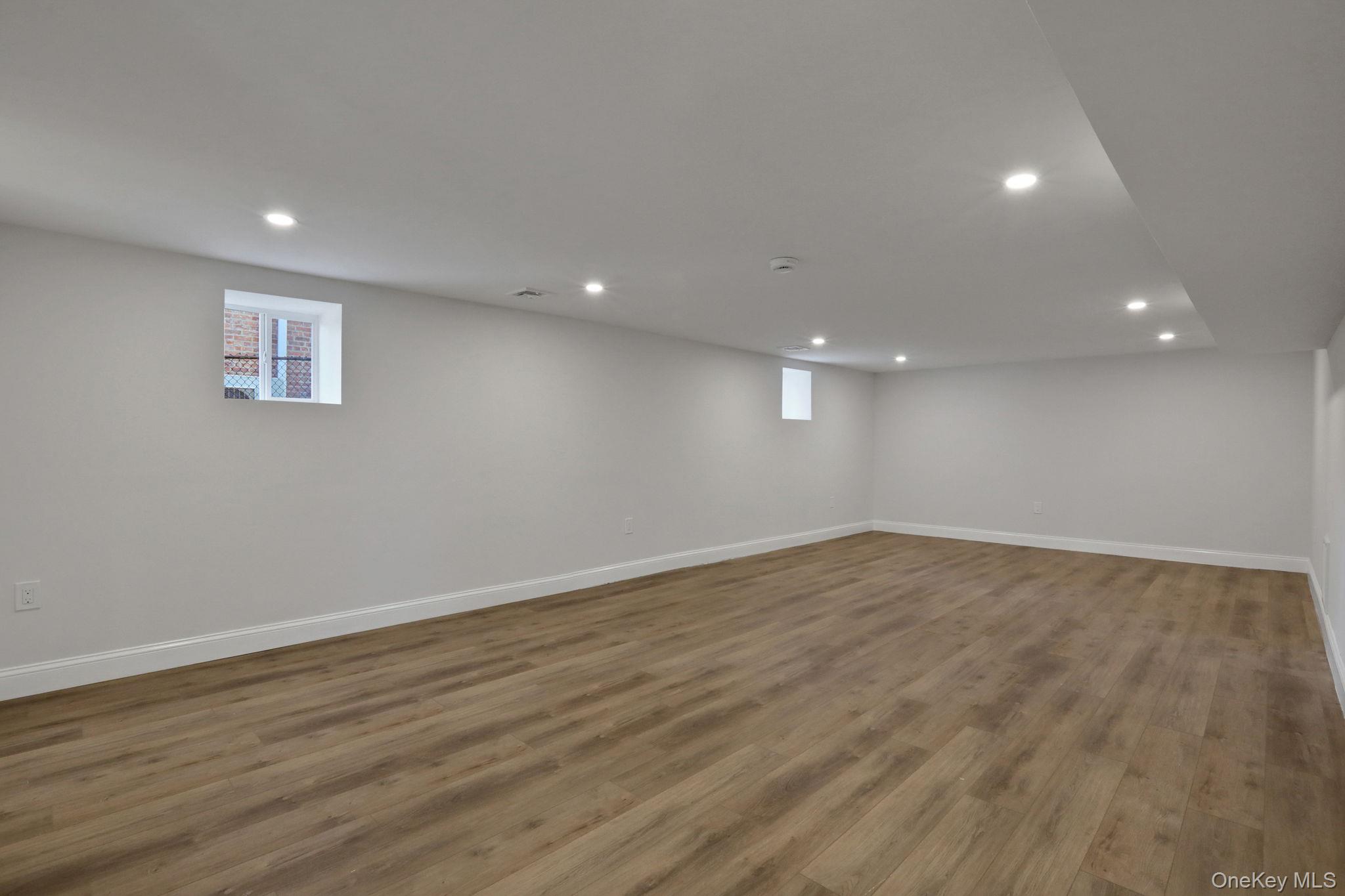 32 Ackerman Street Beacon, NY 12508 - Photo 18 of 37 a view of empty room with wooden floor