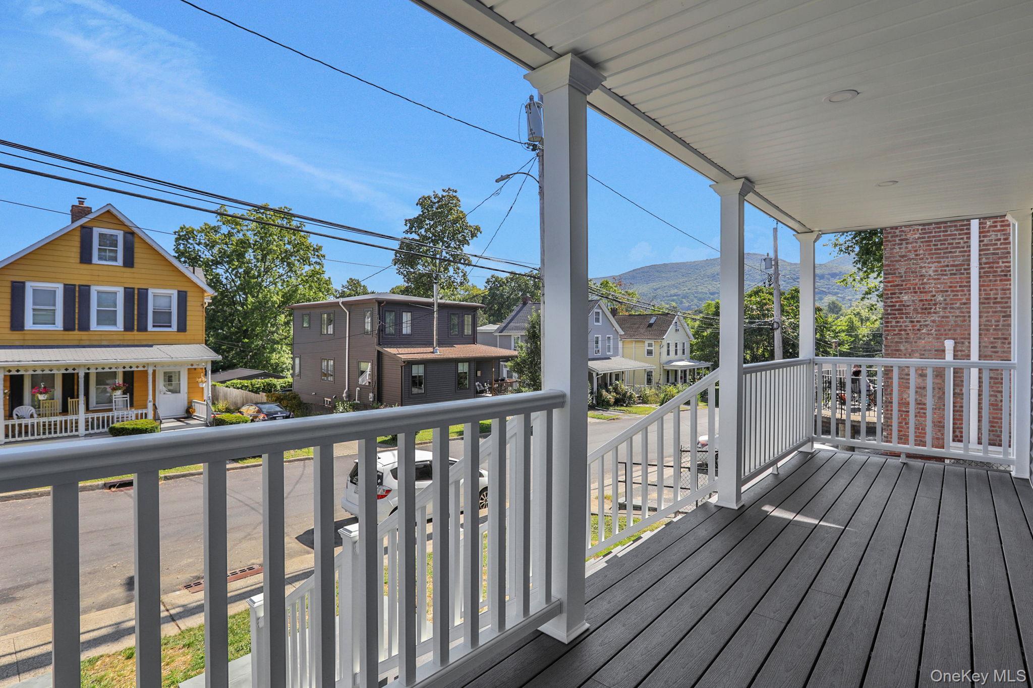 32 Ackerman Street Beacon, NY 12508 - Photo 28 of 37 a view of a house with a balcony
