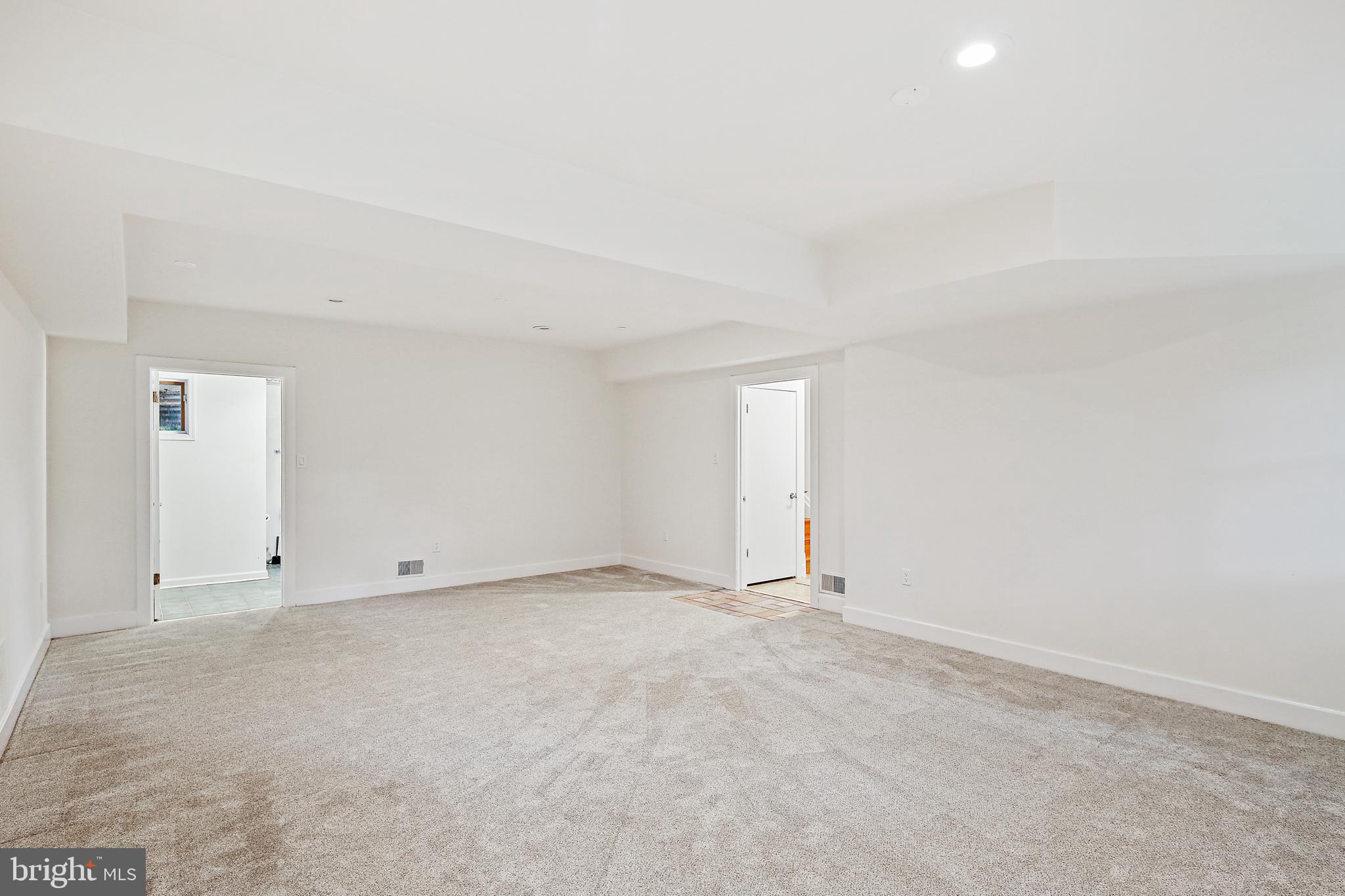 19244 Chandlee Mill Road Sandy Spring, MD 20860 - Photo 49 of 72 LL Family Room w/Access to Garage and Storage Area