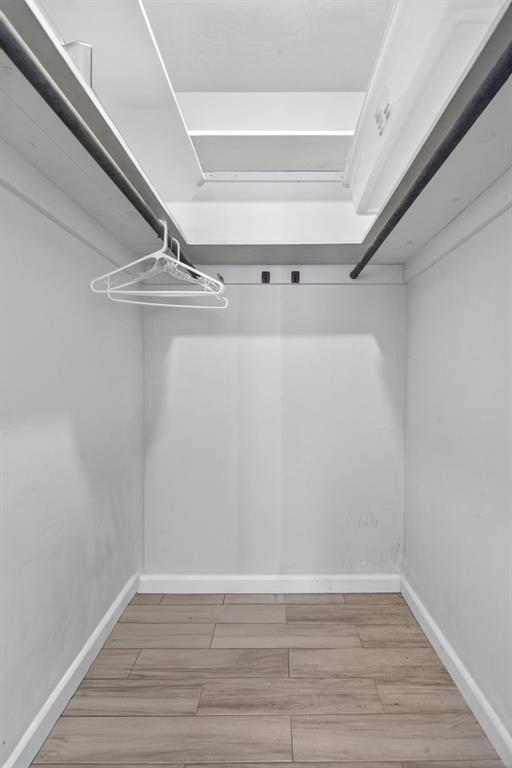 418 South Cypress Road, Unit 110 Pompano Beach, FL 33060 - Photo 20 of 27 a view of an empty walk in closet