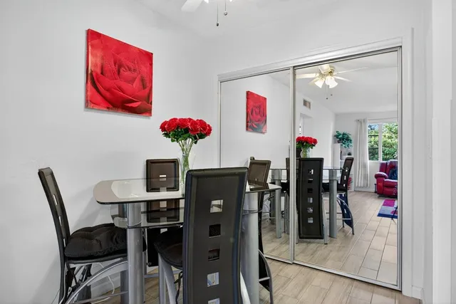 a view of a dining room with furniture