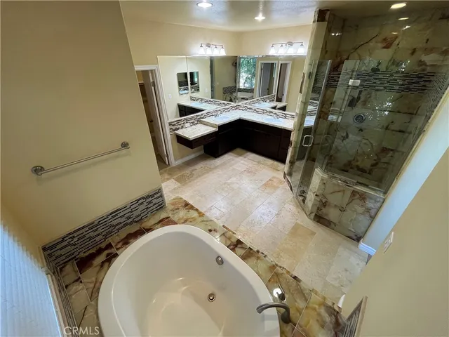 a bathroom with a sink and mirror
