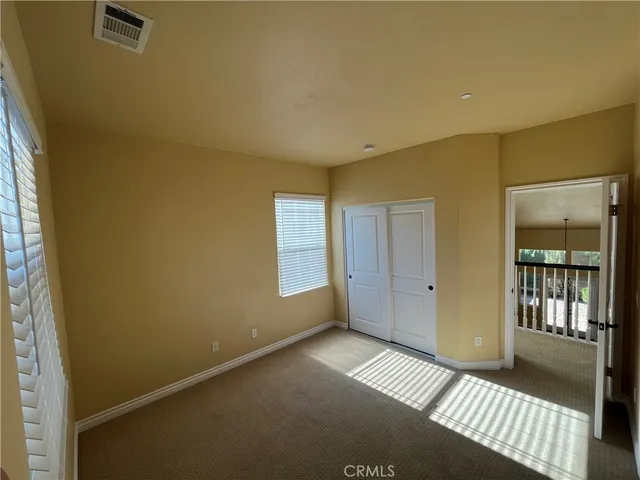 a view of a room with windows