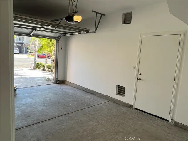 a view of empty room with windows