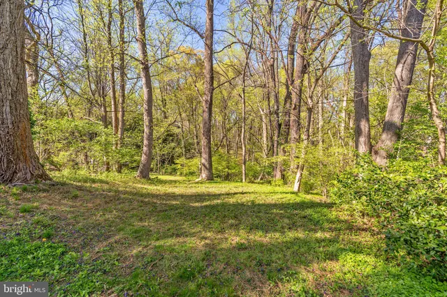 a view of swimming pool with an outdoor space and seating area