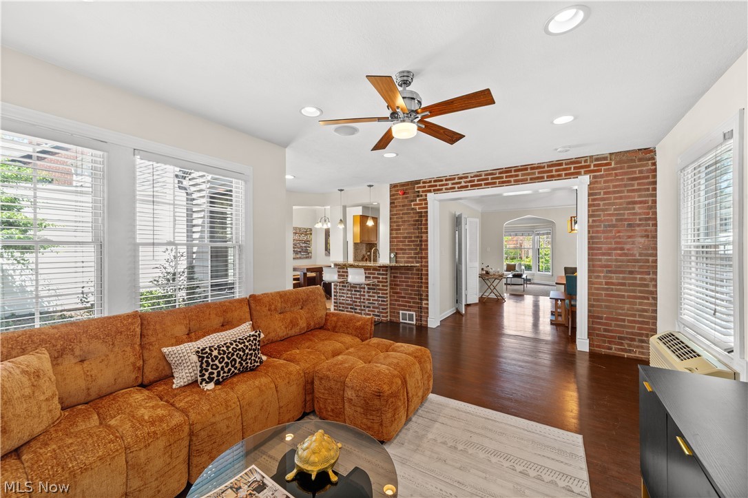 3806 Westwood Road University Heights, OH 44118 - Photo 9 of 41 Living room featuring exposed brick walls, recessed lighting, and a ceiling fan