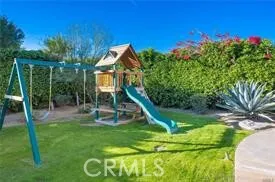 a view of a garden with a slide