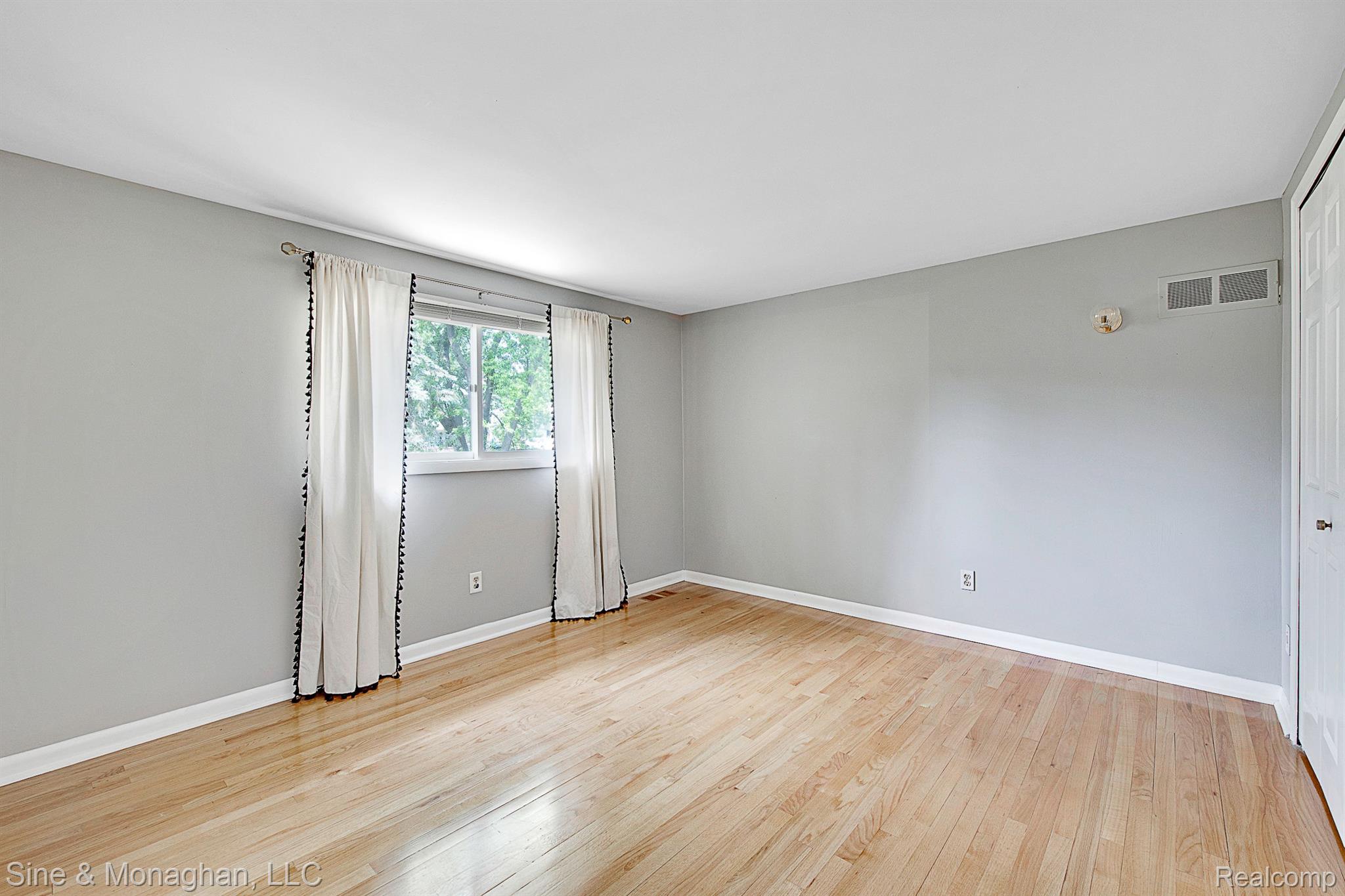 2394 Chalet Drive Rochester, MI 48309 - Photo 21 of 33 Upper bedroom with wood floor