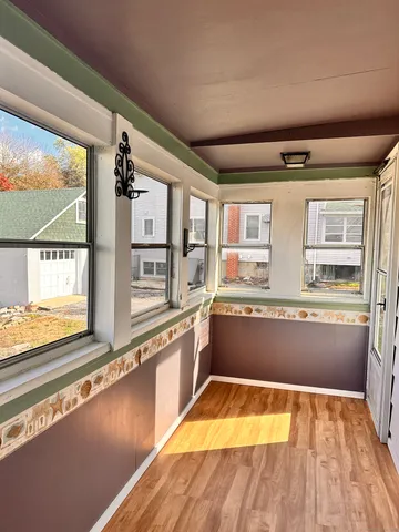 a view of a kitchen with a large window
