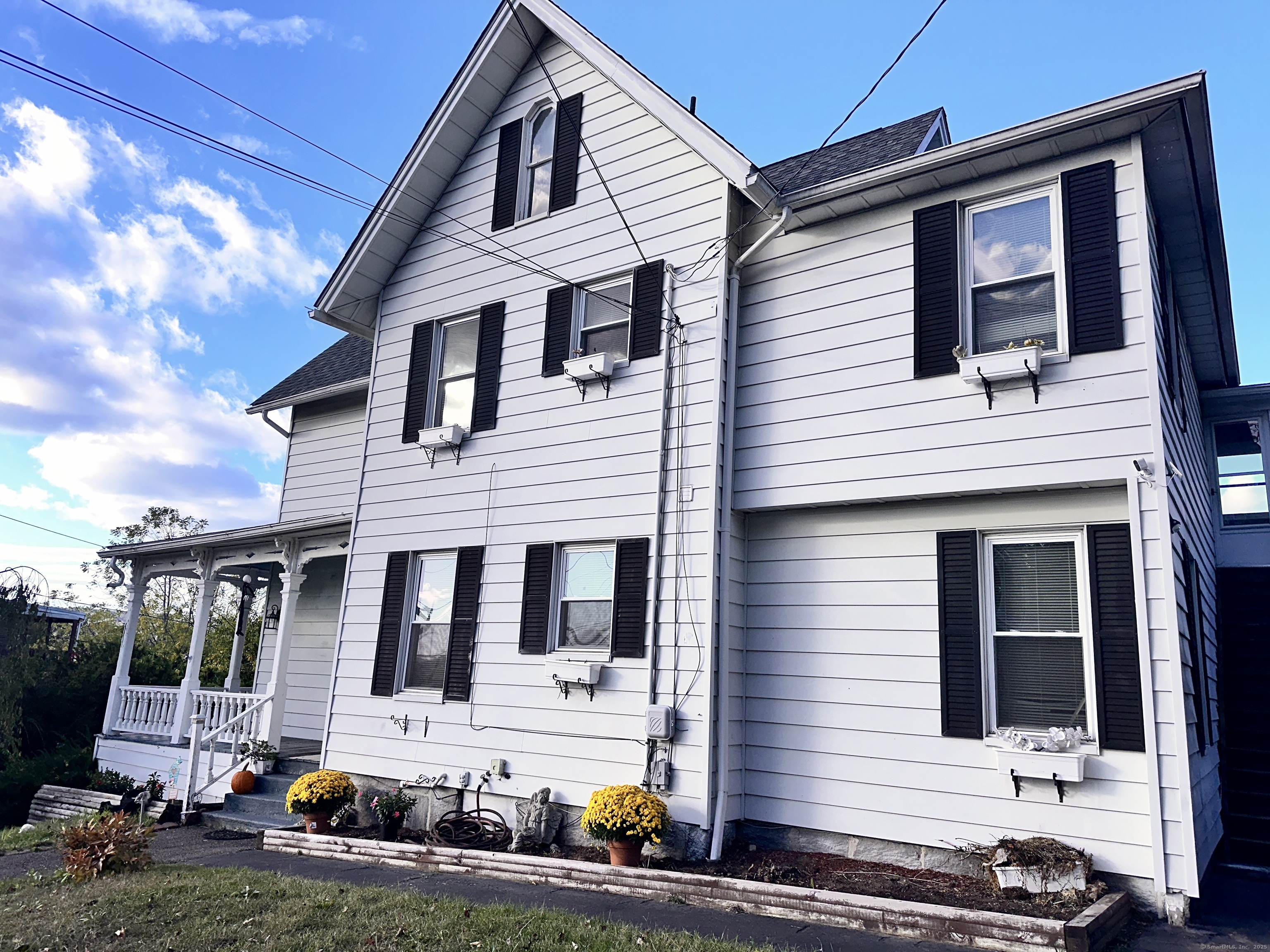 34 North Spring Street Ansonia, CT 06401 - Photo 20 of 20 a front view of a house with glass windows