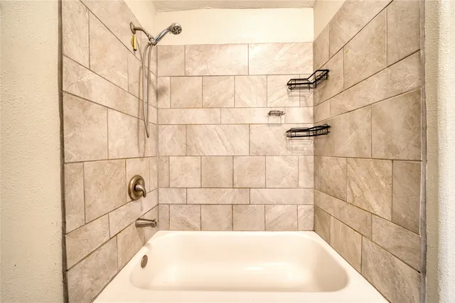 a bathroom with a bathtub