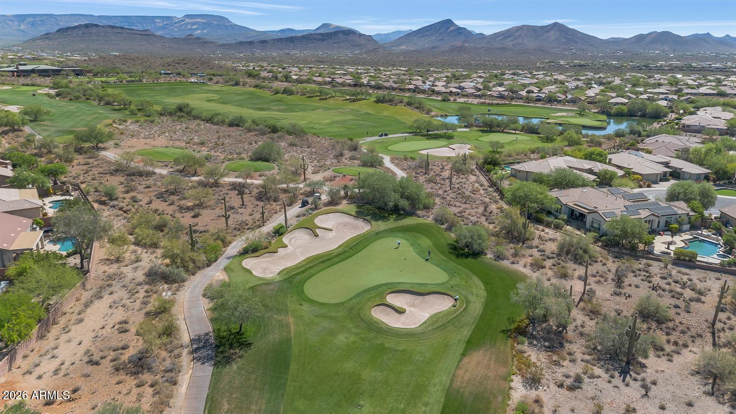 41123 North River Bend Road Phoenix, AZ 85086 - Photo 32 of 45 a view of a lush green hillside and houses