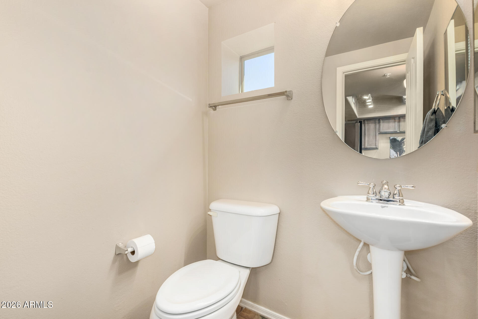 2402 East 5th Street, Unit 1590 Tempe, AZ 85288 - Photo 15 of 33 a bathroom with a toilet sink and mirror