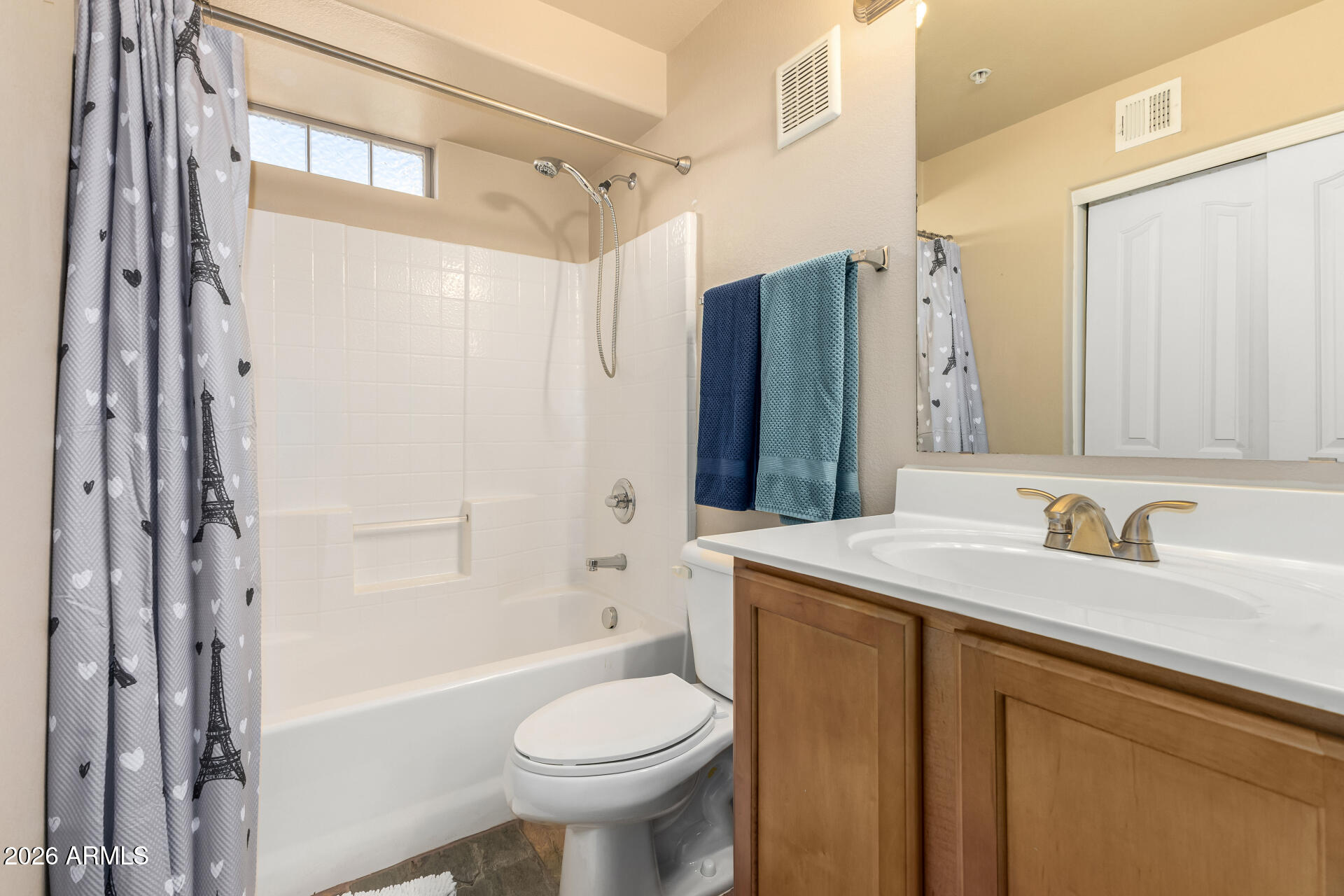 2402 East 5th Street, Unit 1590 Tempe, AZ 85288 - Photo 20 of 33 a bathroom with a sink toilet and shower
