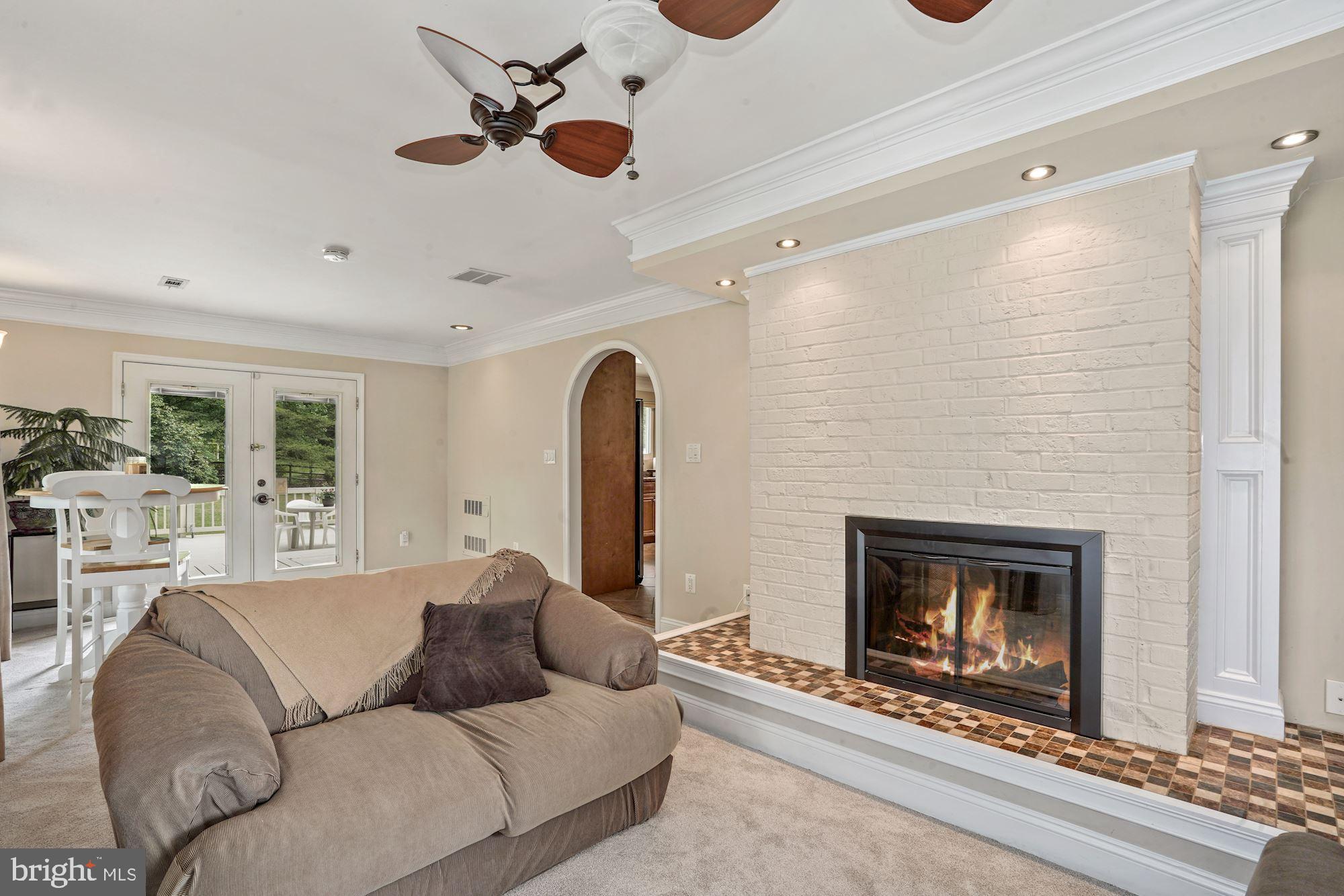 6620 Newington Road Lorton, VA 22079 - Photo 11 of 57 Family Room with Two Sided Gas Fireplace