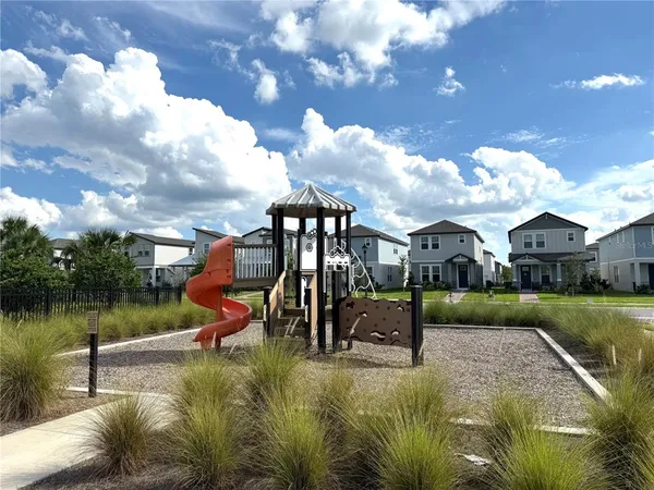 a view of a lake in front of the house