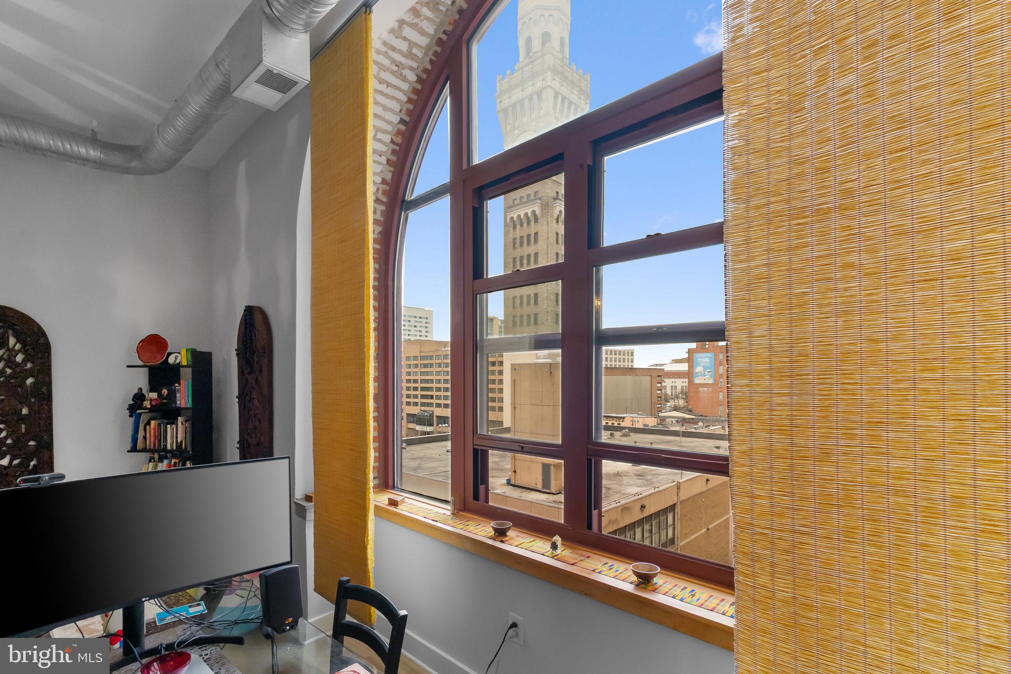 22 South Howard Street, Unit R503 Baltimore, MD 21201 - Photo 7 of 29 a view of a balcony with chairs and a window