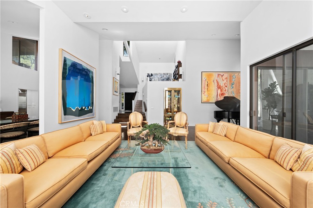 24865 Long Valley Road Hidden Hills, CA 91302 - Photo 14 of 49 a living room with furniture and a large window