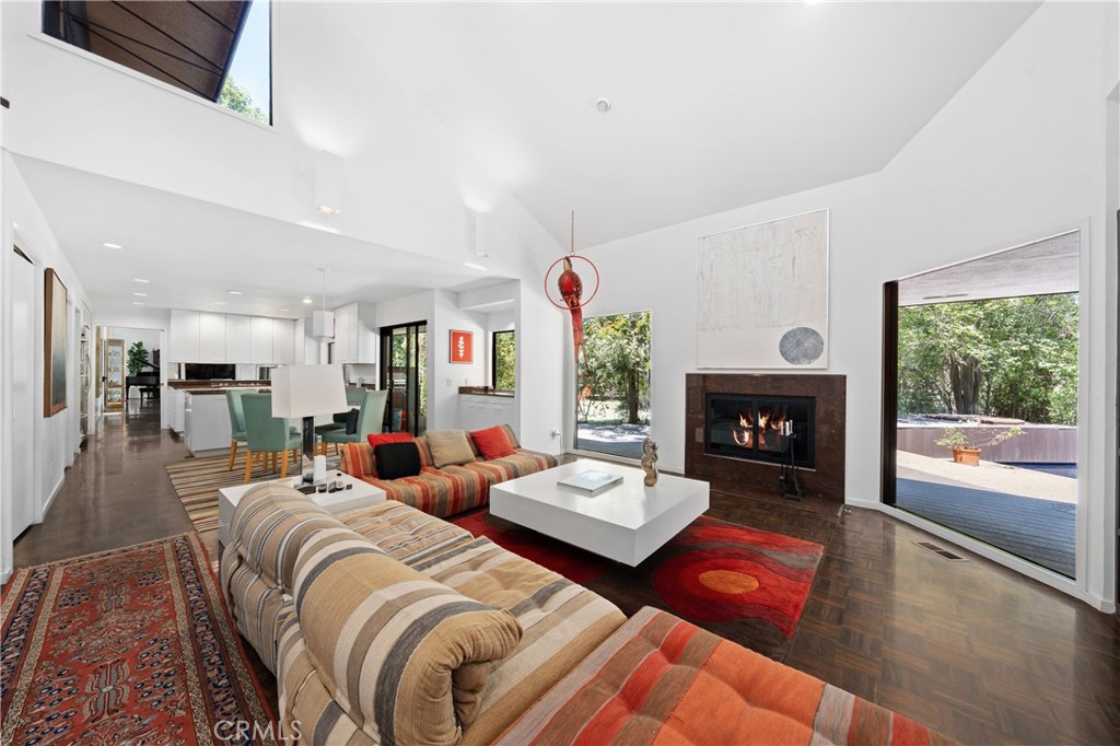 24865 Long Valley Road Hidden Hills, CA 91302 - Photo 18 of 49 a living room with fireplace furniture and a fireplace