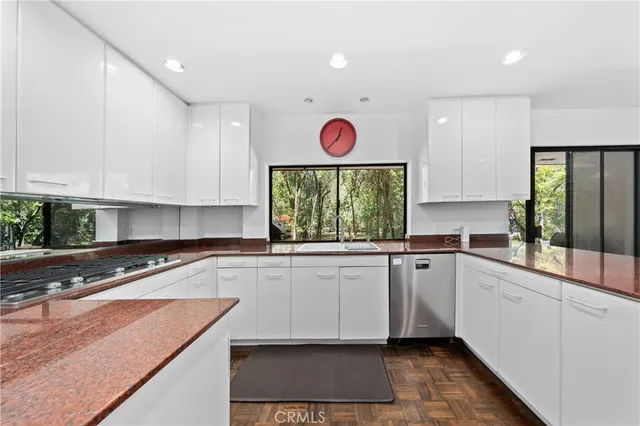 a view of a field with trees in background