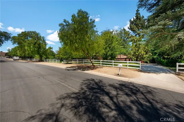a view of an outdoor space and tennis court