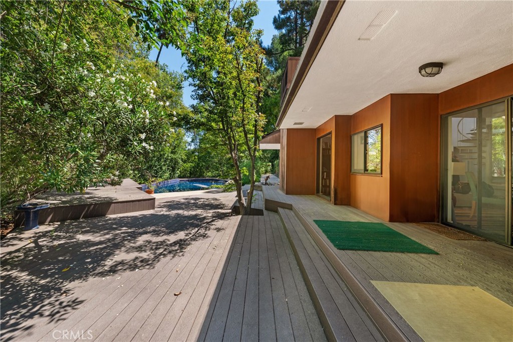 24865 Long Valley Road Hidden Hills, CA 91302 - Photo 36 of 49 a view of a house with backyard