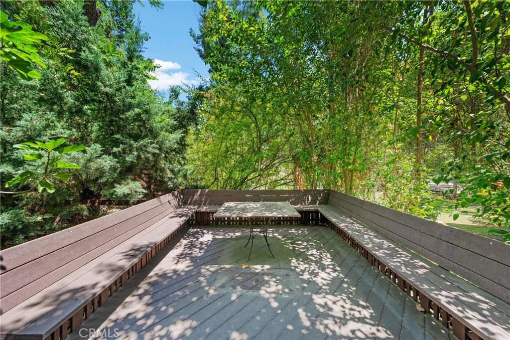 24865 Long Valley Road Hidden Hills, CA 91302 - Photo 38 of 49 a view of a yard with wooden floor