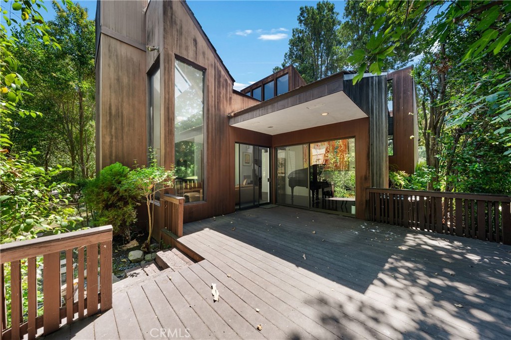 24865 Long Valley Road Hidden Hills, CA 91302 - Photo 39 of 49 a view of a house with a yard