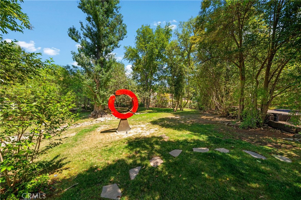 24865 Long Valley Road Hidden Hills, CA 91302 - Photo 46 of 49 a view of a backyard