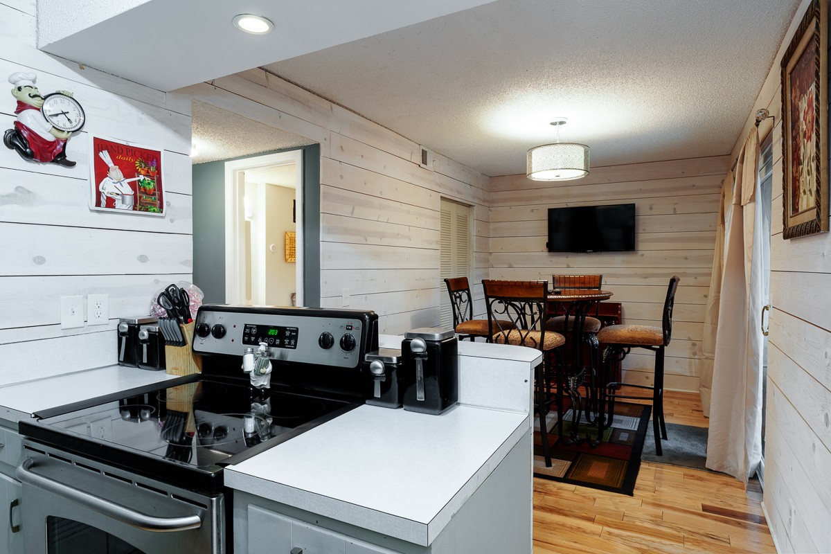 4000 Anderson Road, Unit 82 Nashville, TN 37217 - Photo 11 of 30 a kitchen with a stove and a refrigerator