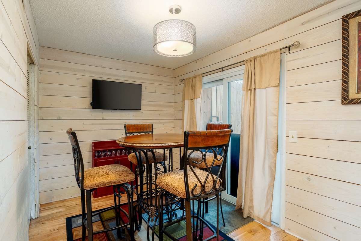 4000 Anderson Road, Unit 82 Nashville, TN 37217 - Photo 15 of 30 a work room with furniture and a flat screen tv