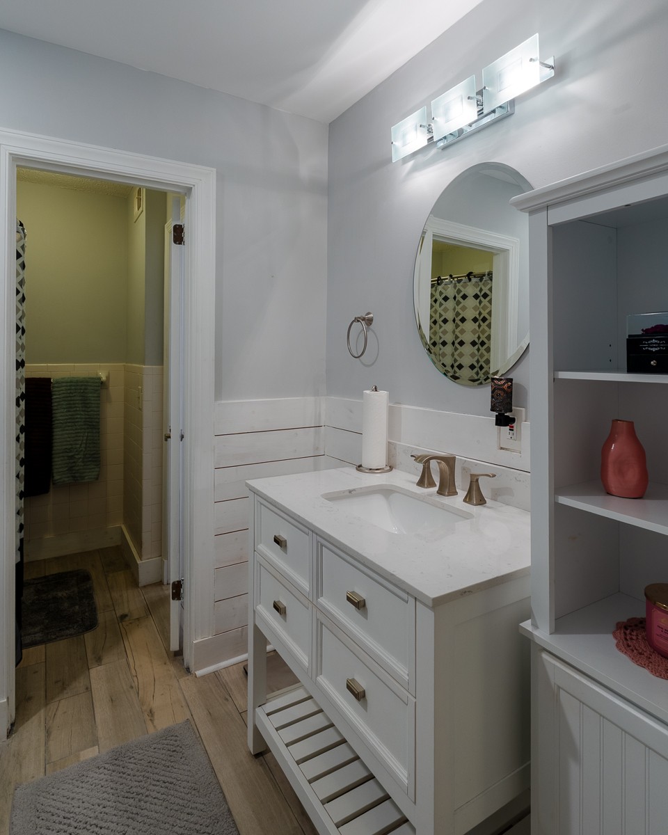 4000 Anderson Road, Unit 82 Nashville, TN 37217 - Photo 26 of 30 a bathroom with a sink vanity and a mirror
