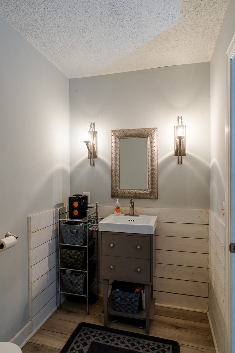 4000 Anderson Road, Unit 82 Nashville, TN 37217 - Photo 28 of 30 a bathroom with a sink and a mirror